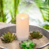 Solar Outdoor White Resin Candle 3 X 6 Inch - Heavy Weighted Base -Battery Operated Candles Shop 44594 solar outdoor candle