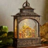 11 Inch Lighted Water Lantern Traditional Nativity Scene With Swirling Glitter - Timer -Battery Operated Candles Shop nativity scene water lantern