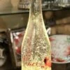 Lighted Wine Bottle With Swirling Glitter Peace Poinsettia Design With Cardinals Snow Globe -Battery Operated Candles Shop peace bottle