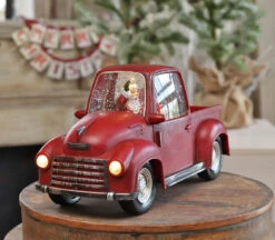 Lighted Red Truck Water Lantern With Santa In Swirling Glitter -Battery Operated Candles Shop red truck front lights