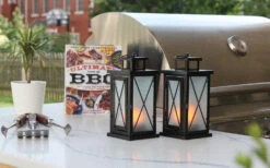 Set Of 2 LED Fire Flame Metal And Glass Lanterns