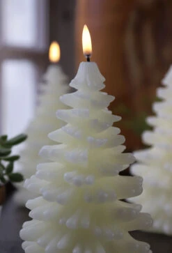 Uyuni 4.25 X 8 Inch Ivory Christmas Tree Candle - Remote Ready 11 Uyuni 4.25 X 8 Inch Ivory Christmas Tree Candle - Remote Ready -Battery Operated Candles Shop tree close up for email